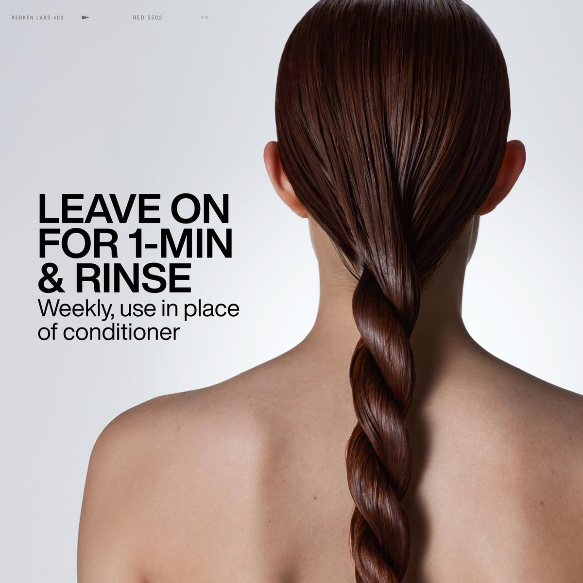 Redken open jar view displaying creamy formula and moisturizing consistency