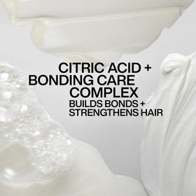 Redken in-shower on wet hair lather demonstrating gentle sulfate-free cleanse