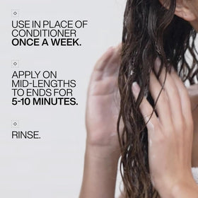 Redken label details close-up showing ingredients and usage guidance for consumers
