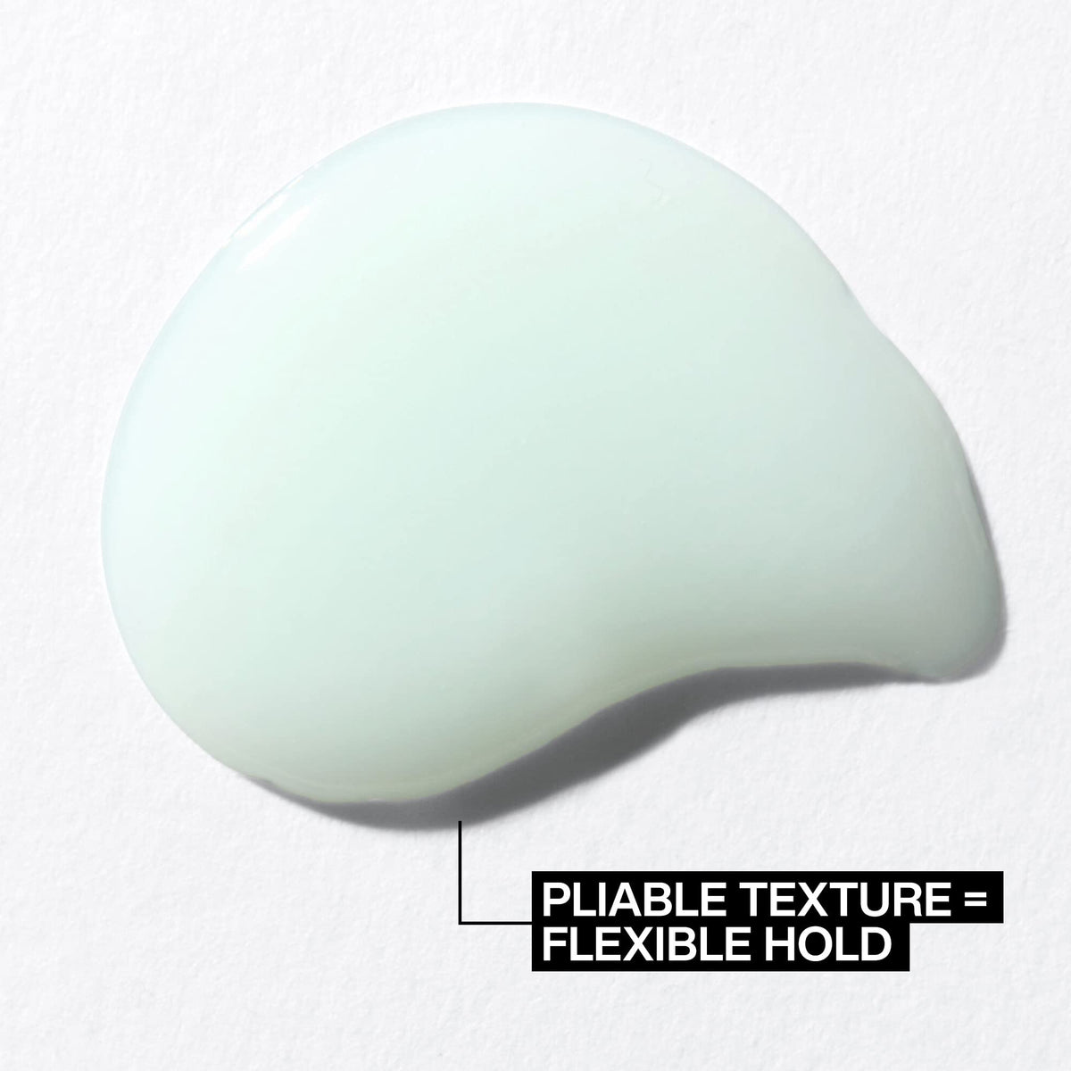 Redken pliable paste styled on short layered haircut showing defined texture and separation