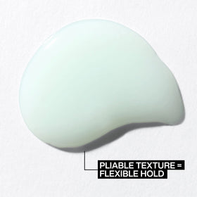 Redken pliable paste styled on short layered haircut showing defined texture and separation