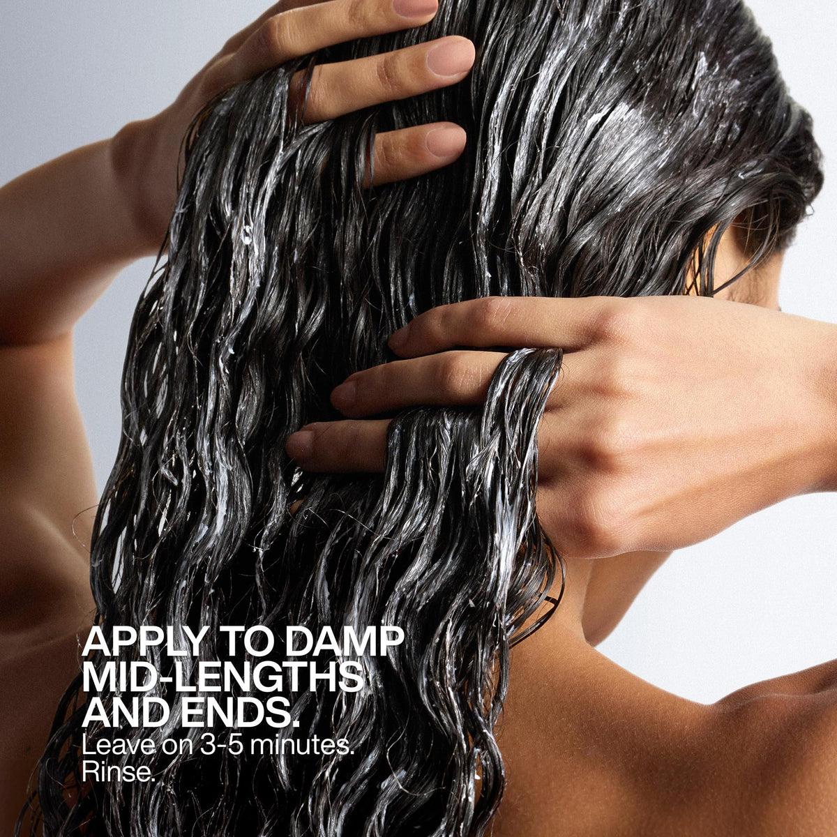 Redken product label close-up showing ingredients and directions benefit