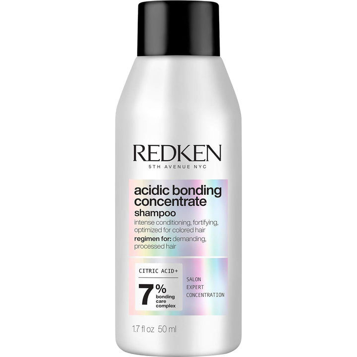 Redken front packaging shows compact bottle and professional repair benefit
