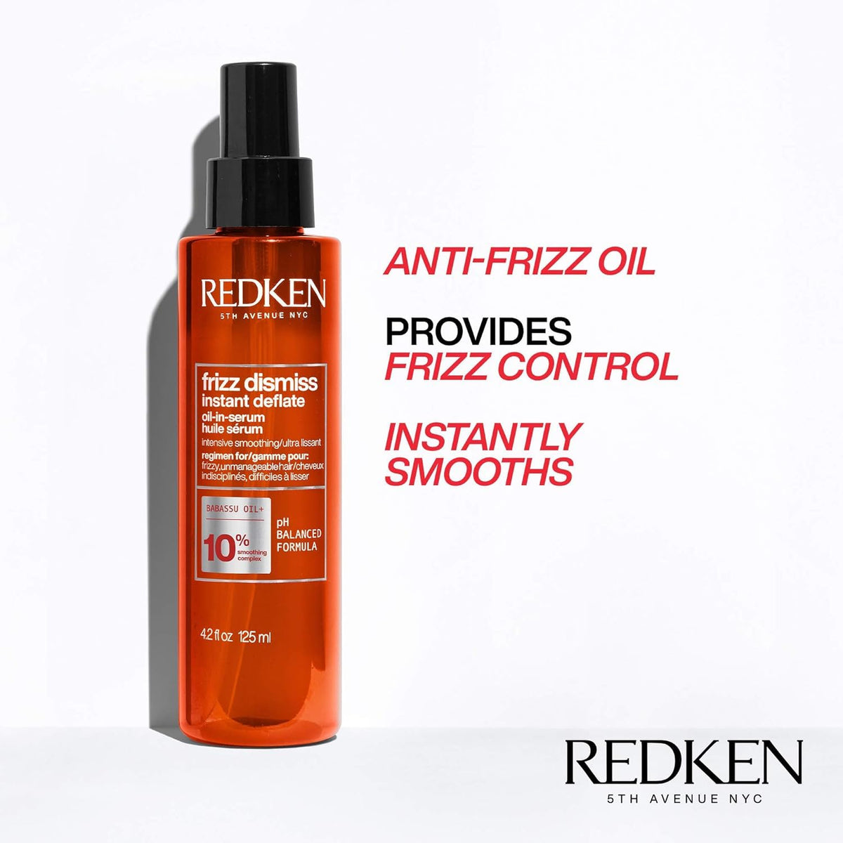 Redken serum texture on hair strands highlighting smoothing action and added shine