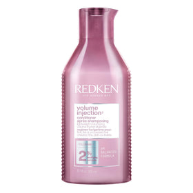 Redken front bottle view showing product branding and volumizing focus