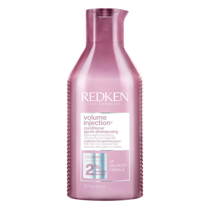 Redken front bottle view showing product branding and volumizing focus