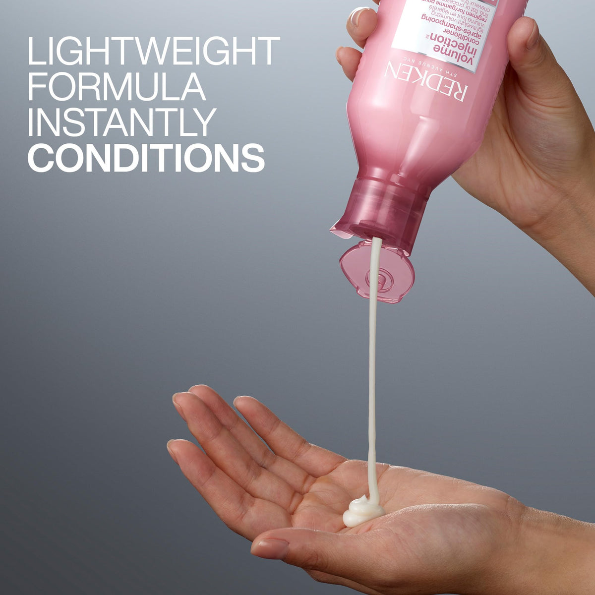 Redken bottle in hand showing 10.1 fl oz size for scale and portability