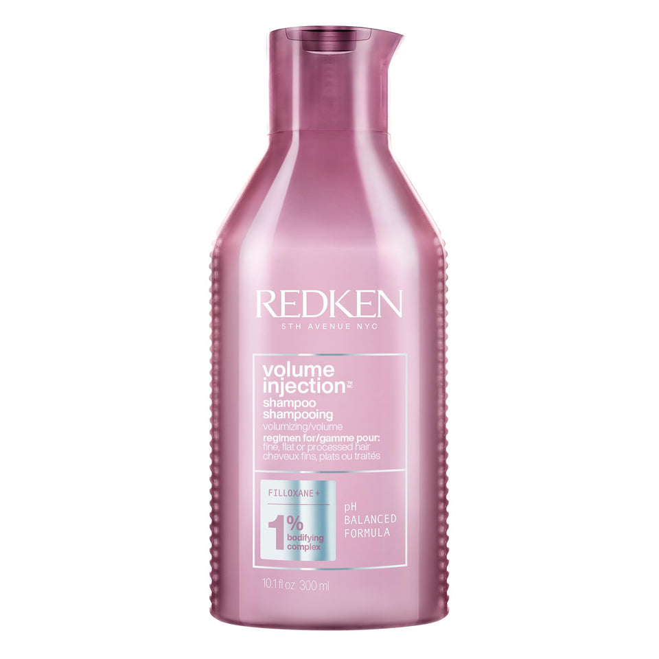 Redken bottle front view showing brand and volumizing benefit