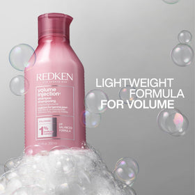 Redken on bathroom shelf in lifestyle scene suggesting everyday use