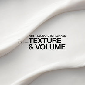 Redken Volume Injection on salon shelf indicating professional brand and visibility
