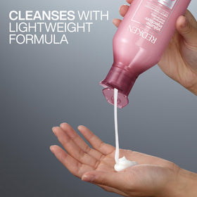 Redken bottle next to a 1 oz for clear size comparison