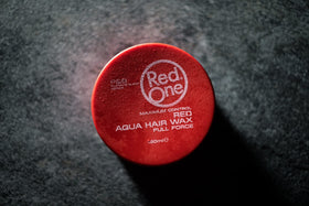 Redone Red One size comparison in hand conveying 150ml practical everyday jar