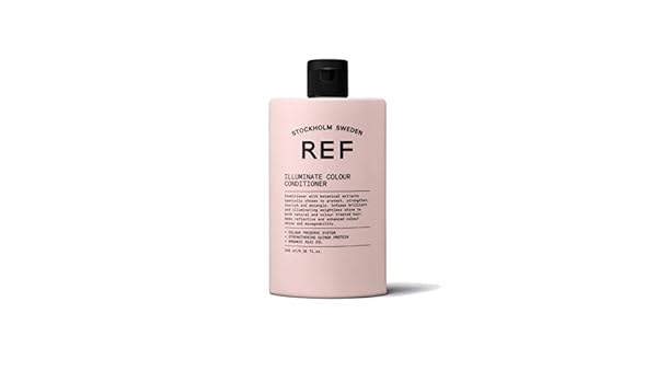 REF Illuminate applied to mid-lengths and ends for smoother hair benefit