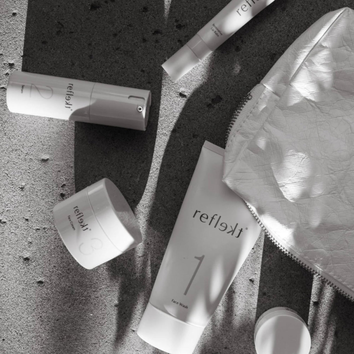 REFLEKT on bathroom shelf in styled routine showing clean cruelty-free benefit