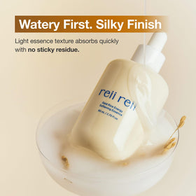 reii reii bottle next to everyday items for scale, indicates compact 80ml travel-friendly size