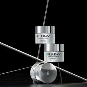 REJURAN jar on a bathroom shelf in lifestyle scene showing daily routine-ready benefit