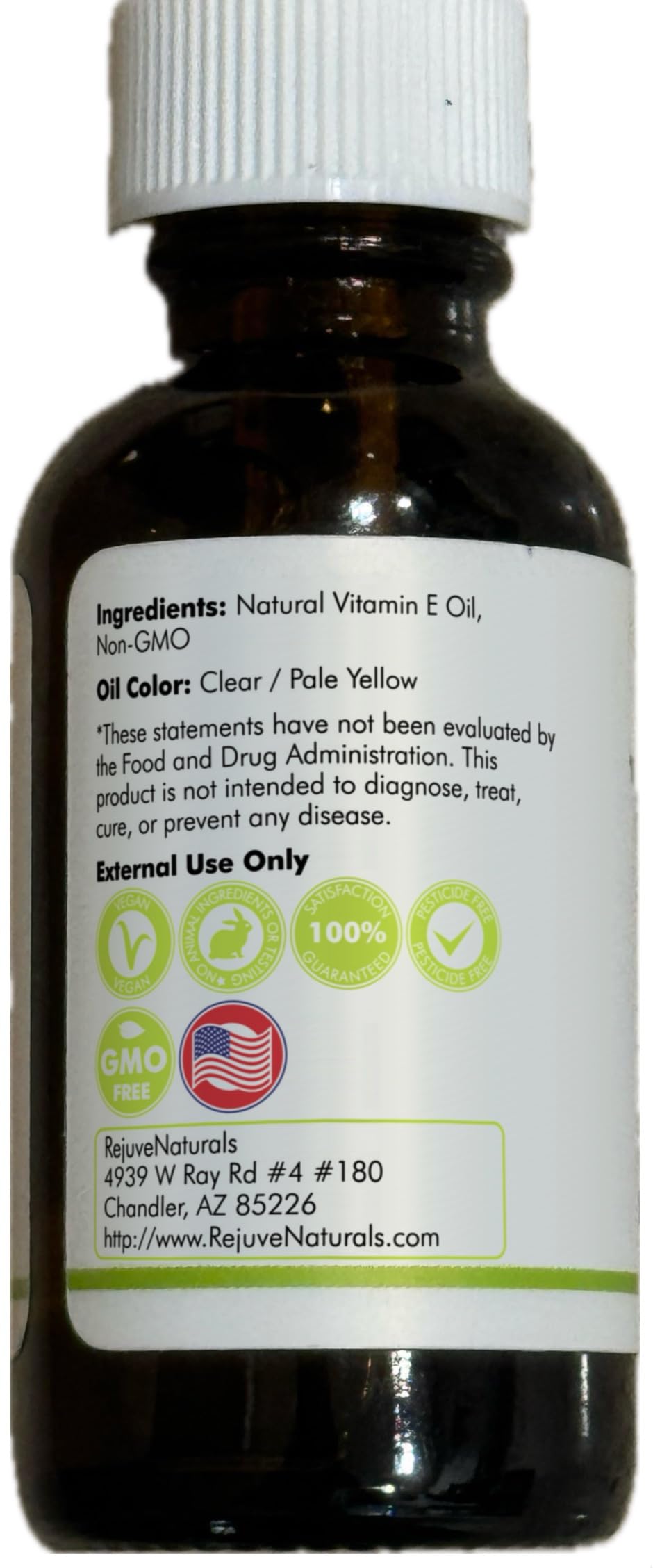 RejuveNaturals bottle beside olive branch showing plant-based source