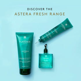 René Furterer shampoo placed beside towel in bathroom lifestyle scene