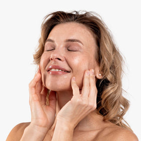 Replenix serum being applied to hand to show smooth hydration and quick spreadability