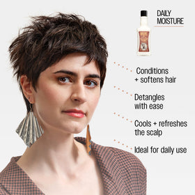 REUZEL applied to damp hair illustrating cooling feel and lightweight conditioning