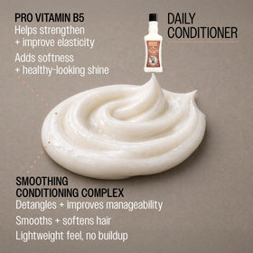 REUZEL creamy conditioner texture closeup showing smooth formula for easy detangling