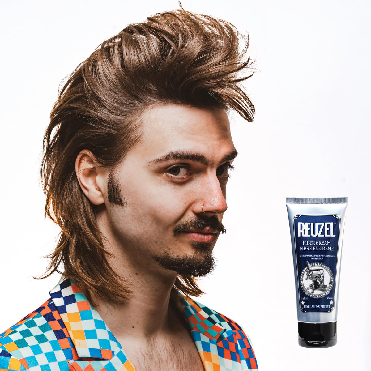 REUZEL fiber cream on bathroom shelf in lifestyle scene conveying daily grooming benefit