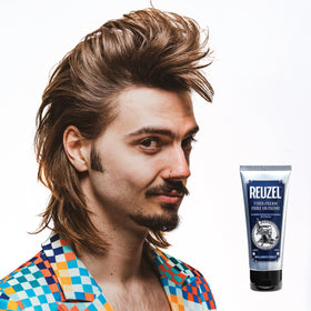 REUZEL fiber cream on bathroom shelf in lifestyle scene conveying daily grooming benefit