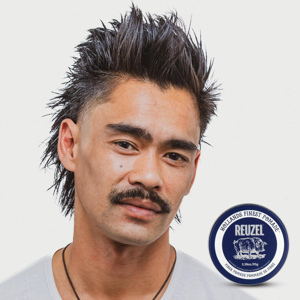REUZEL styled hair lifestyle shot showing natural matte texture and definition