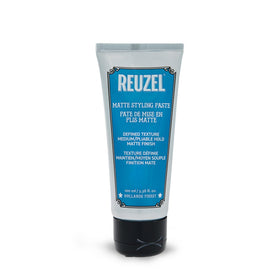 REUZEL jar front view showing matte paste and branding for quick identification