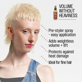 REUZEL being used during blow-drying offering heat protection and lift