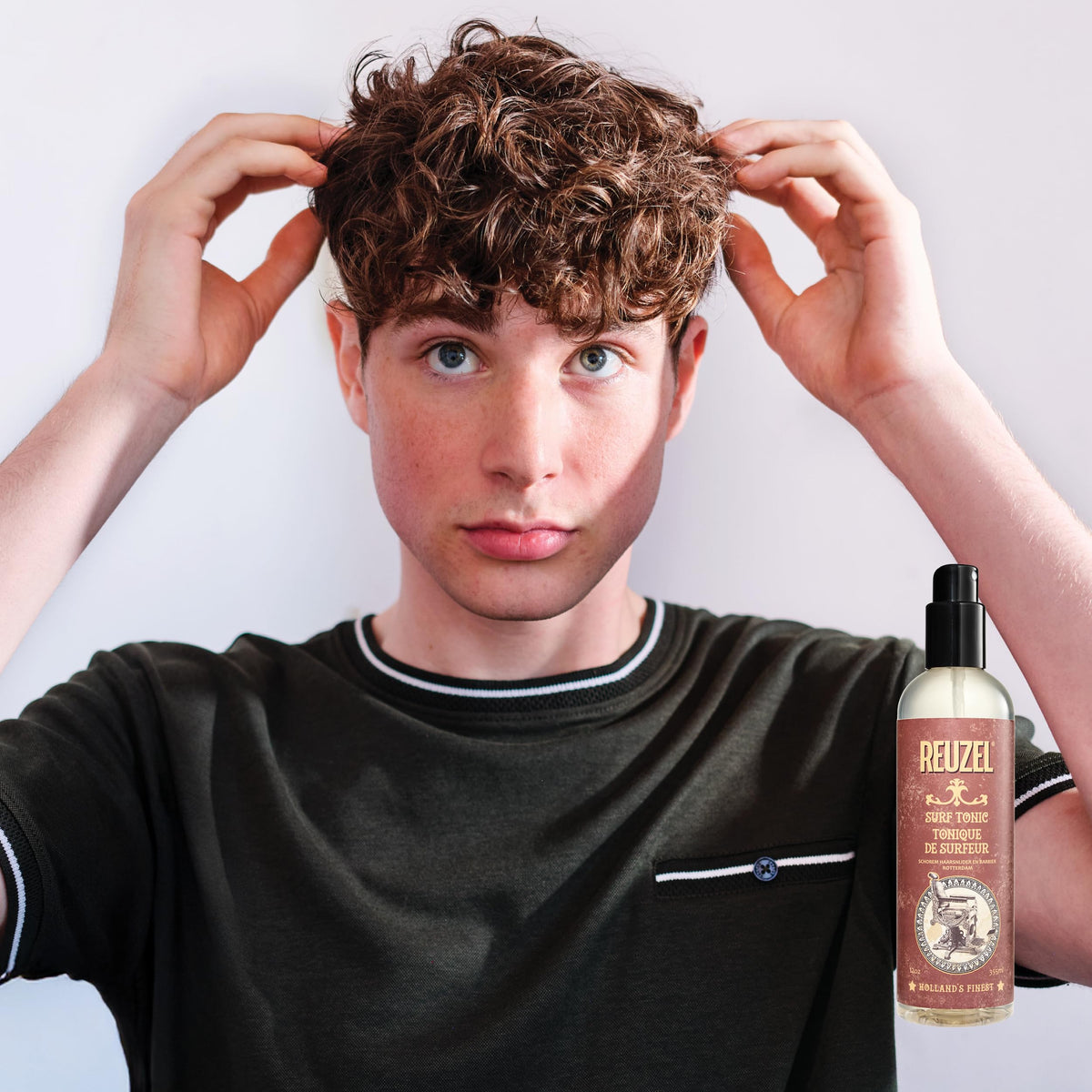 REUZEL Surf Tonic spritz on dry hair for quick restyle and touchable texture