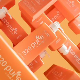 Rev320 used on curly hair outdoors showing defined, frizz-reduced curls