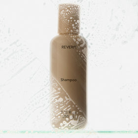 REVERIE shampoo in a bathroom setting showing everyday routine simplicity