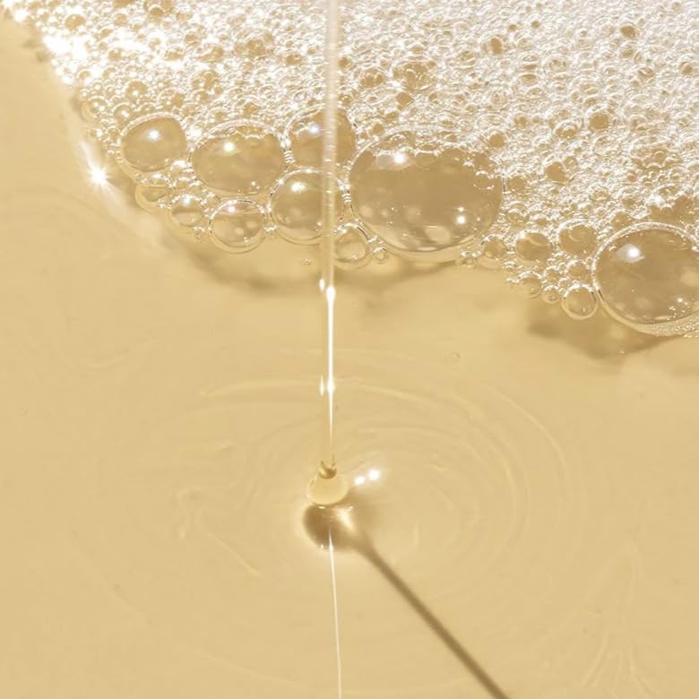 REVERIE pump close-up with texture showing easy dispensing benefit
