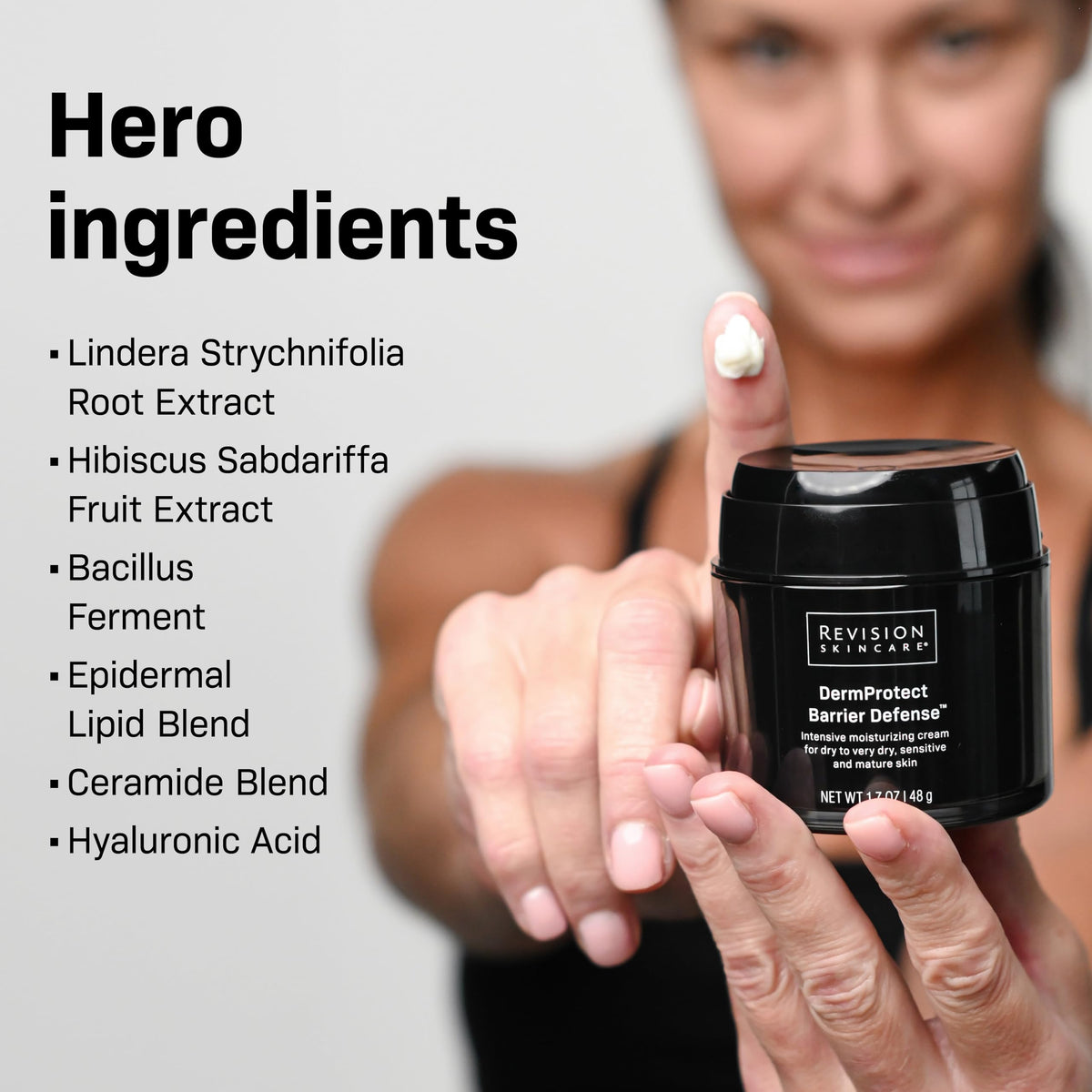 Revision Skincare cream on hand illustrating quick absorption and immediate soothing benefit
