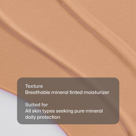 Revision Skincare on a model outdoors showing natural glow and protected skin
