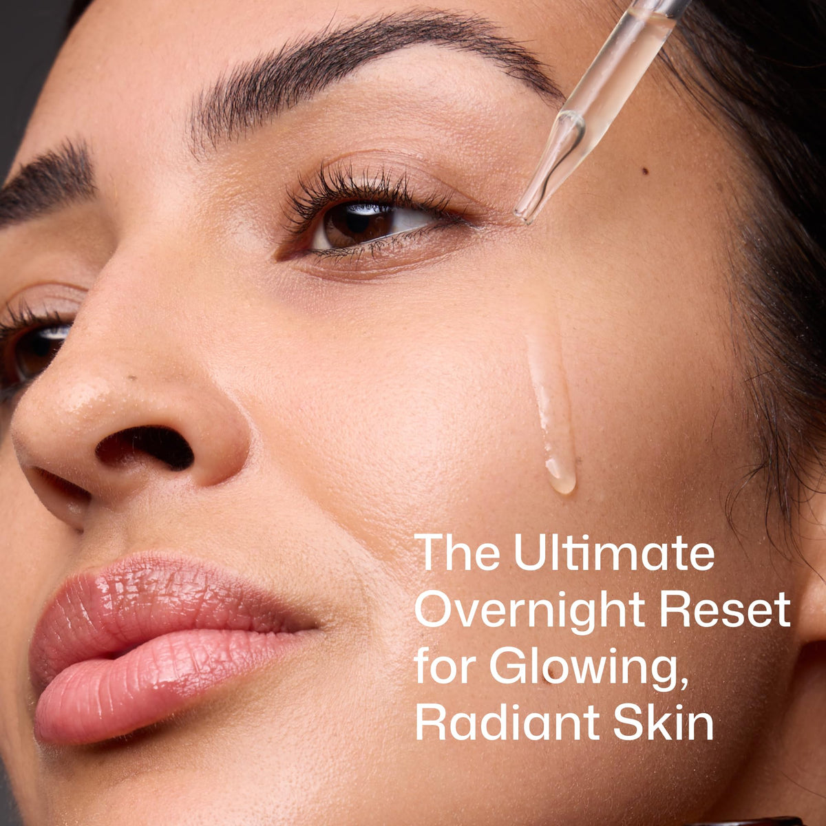 Revision Skincare dropper dispensing serum demonstrating precise overnight dosage