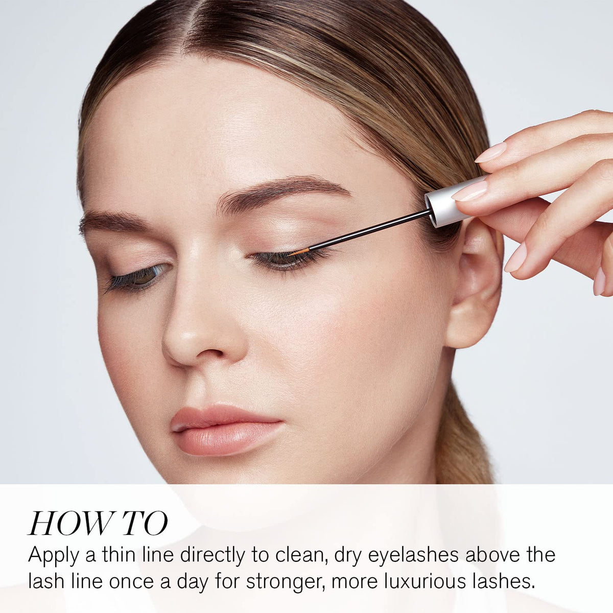 RevitaLash applicator close-up displaying serum texture for precise lash protection