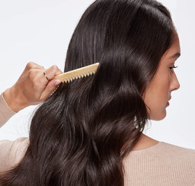 RevitaLash lifestyle shot of washing hair showcasing fuller-looking results