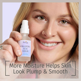 Reviva Labs dropper dispensing a clear serum for precise, mess-free application