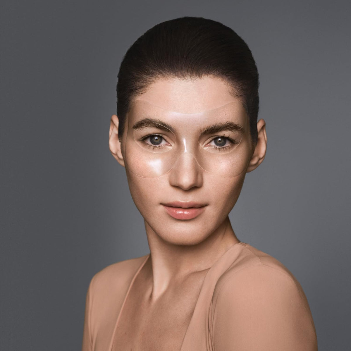 RéVive size and scale comparison showing one patch next to fingertip for fit