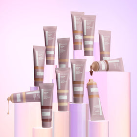 Revlon Illuminance next to small items to show 0.94 fl oz travel size