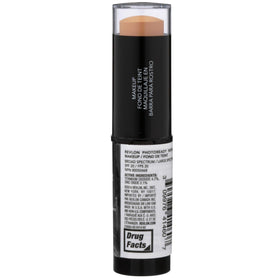 Revlon applying foundation stick on cheek demonstrating quick coverage and touch-up convenience