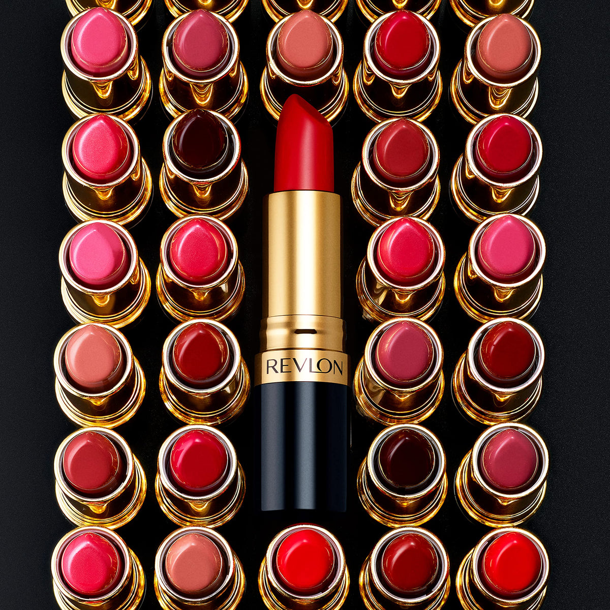 Revlon lipstick being applied to lips showing precise color payoff benefit