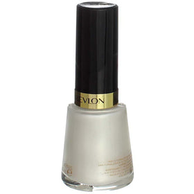 Hand model holding Revlon bottle to show actual size and scale