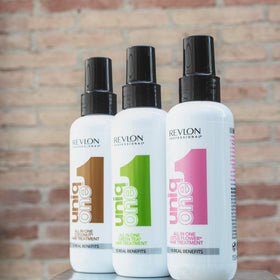 Revlon Professional UniqOne displayed in bathroom setting to evoke salon-style routine