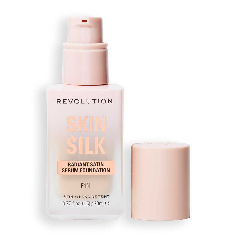 Revolution bottle front view showing product and natural satin finish benefit