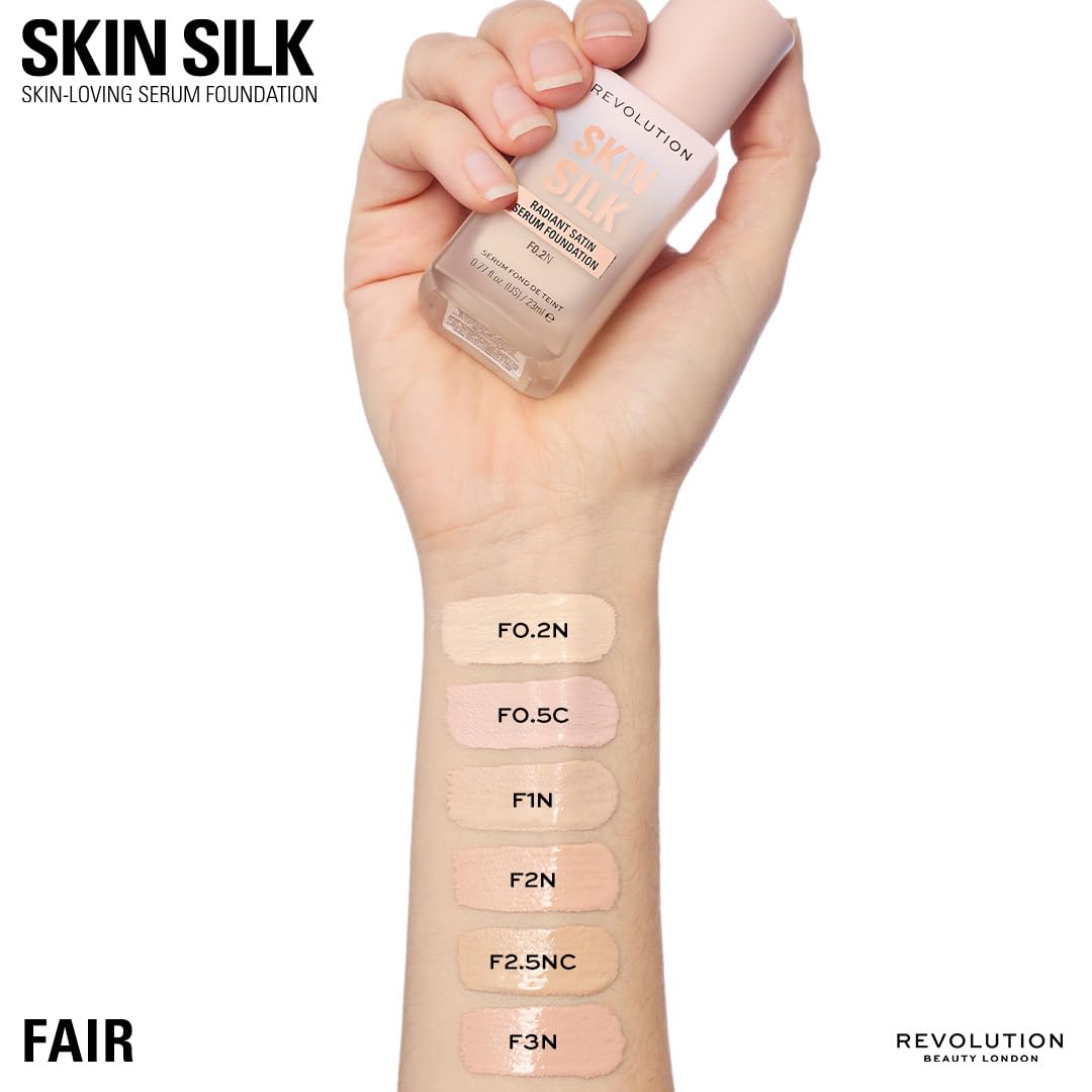 Revolution Skin Silk F3N swatch strip on arm showing fair neutral-pink match