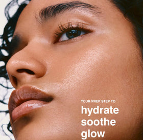Rhode Glazing Milk texture close-up displaying silky milky essence and quick-absorb hydration