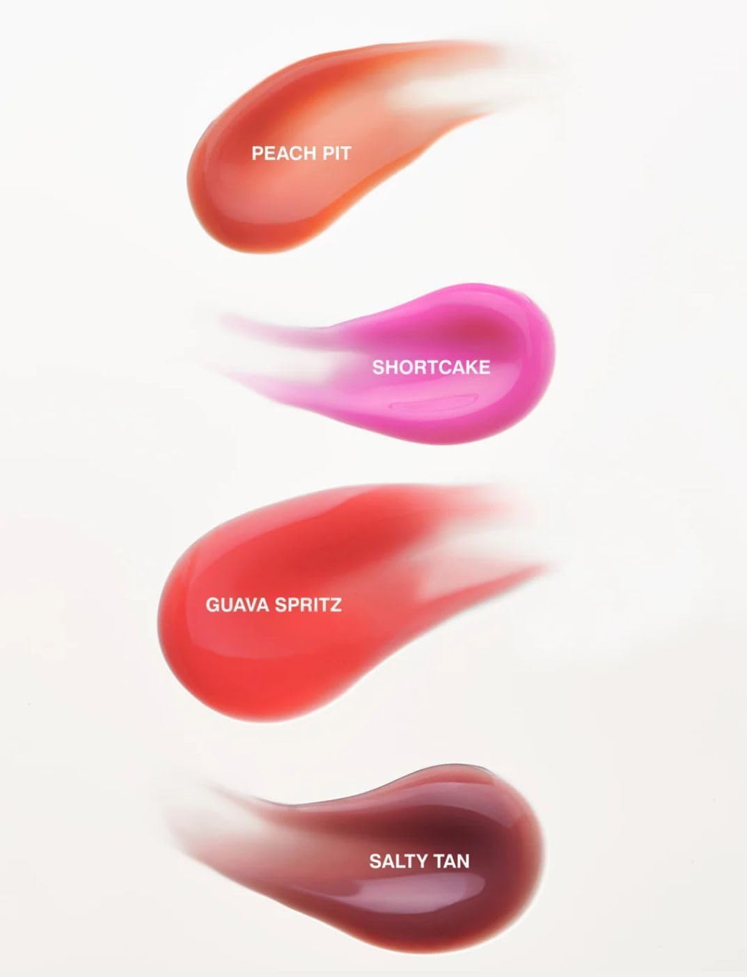 Rhode gloss lip tint on model lips offering natural warm shine and dimension